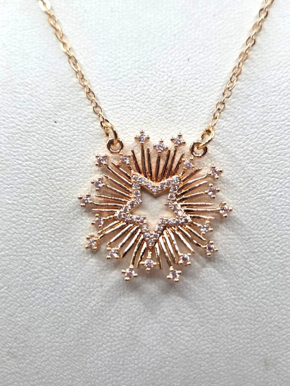 Starburst Pendant Necklace With Dainty Stones On Gold-Tone Chain Jewelry